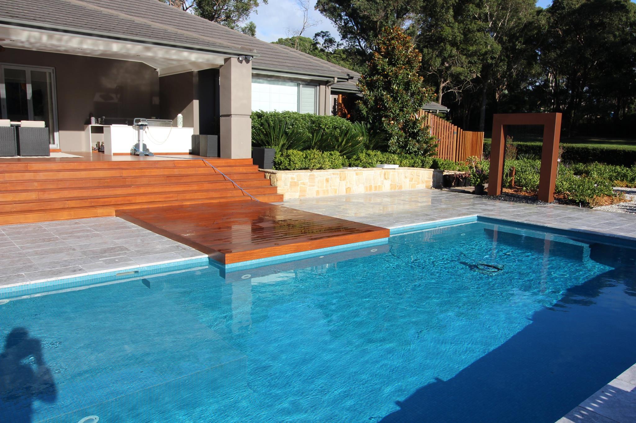 Backyard pool in Sydney home with a new deck