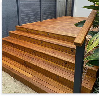 A backyard deck with handrail in Sydney